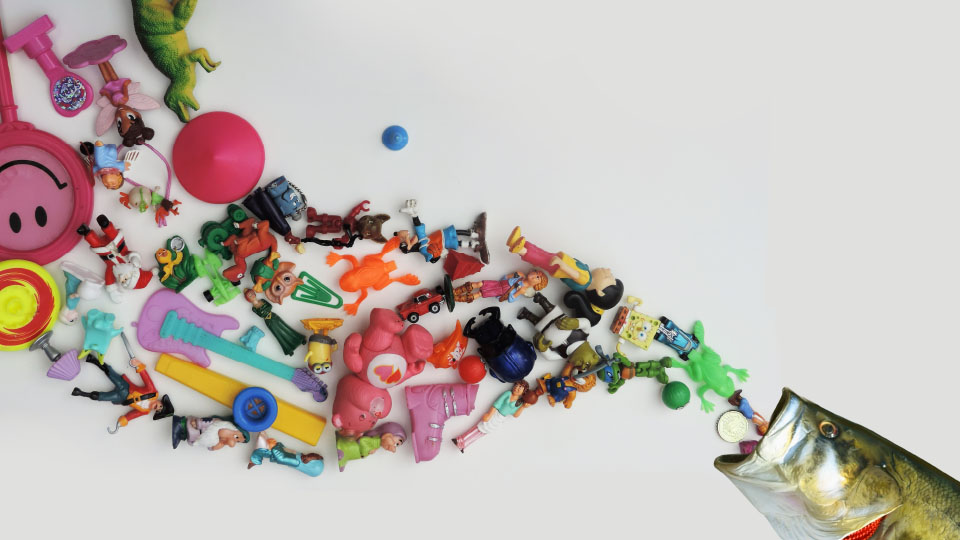 photo of student's work: a fish emptying contents of small plastic toys