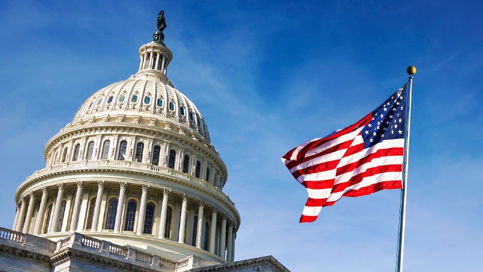 US flag and the white house. 