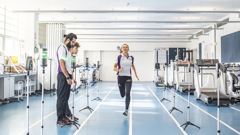 Athlete being monitored on indoor running track