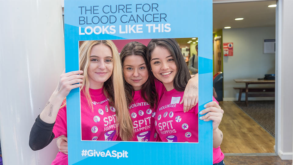 photo of volunteers at Spit Happens event