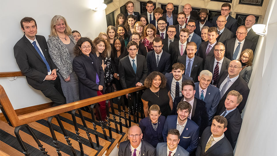 Photo of staff, students and other guests on Hazlerigg staircase at the Academic Excellence Awards 2018