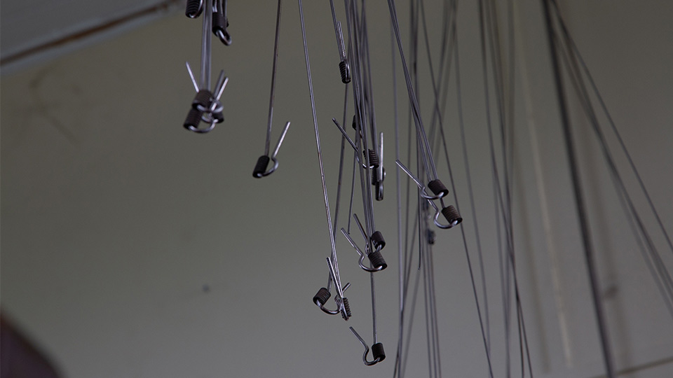 Image taken of wires in the Carillon Tower by Sam Belinfante.