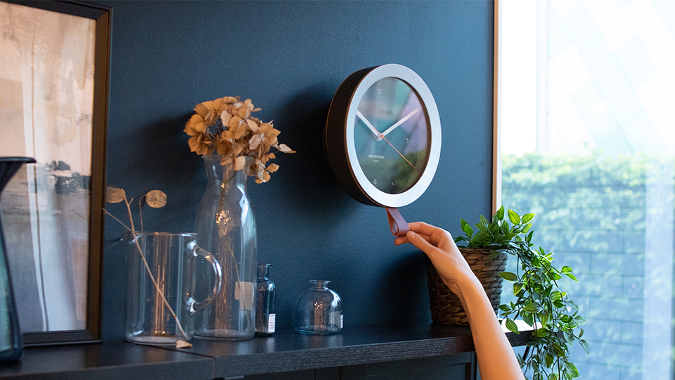 Photo of alarm clock by Hannah Rayner - shows the clock design on a wall inside the home