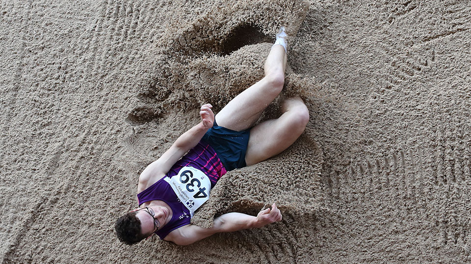 Sam Khogali in the long jump