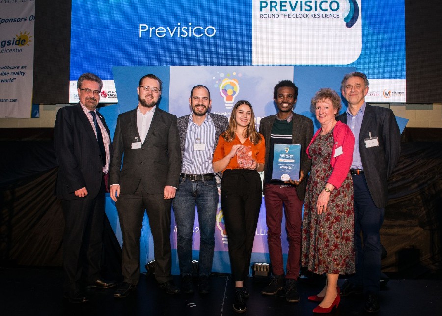 Previsco collecting their award.