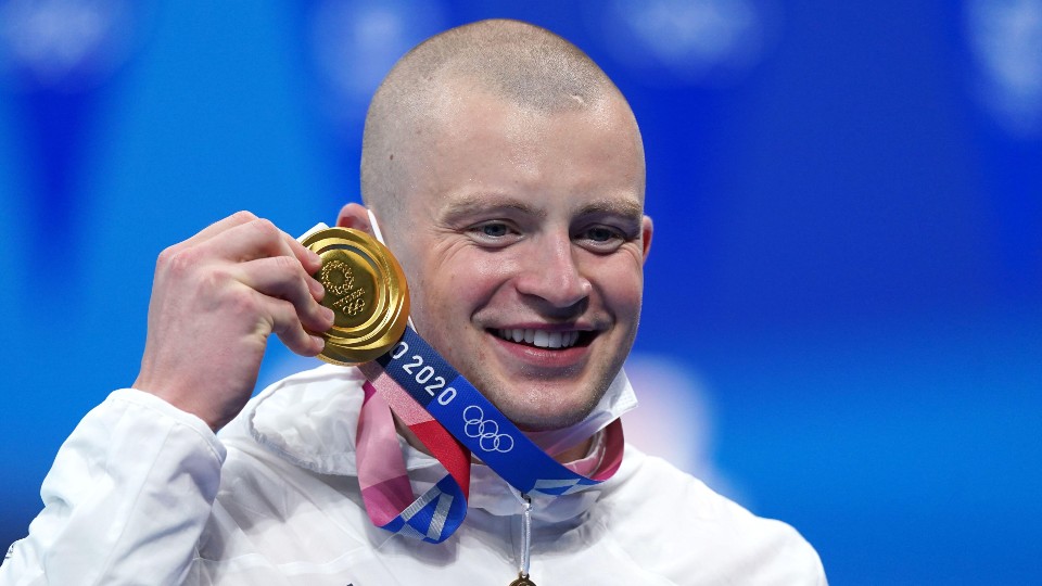 Adam Peaty with his Gold medal