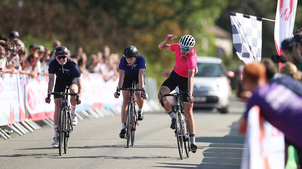 Photo of three bikers on a track competing in a race at a previous School Games National Finals