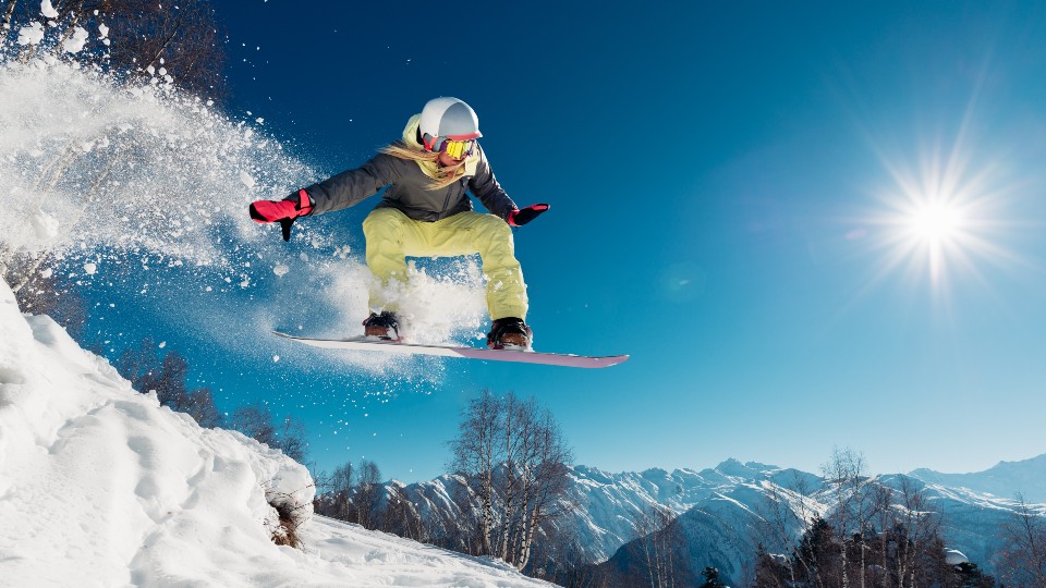 A snow boarder in action