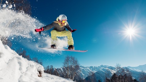 A snow boarder in action