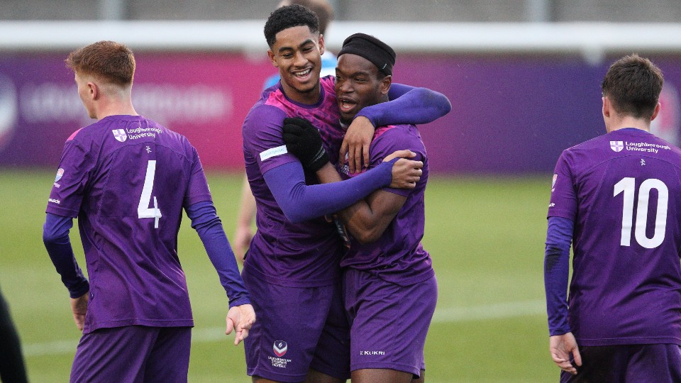 loughborough's men's footballers in action.