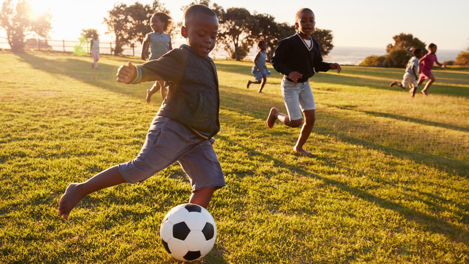 a child playing football