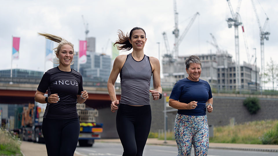 Three women running 