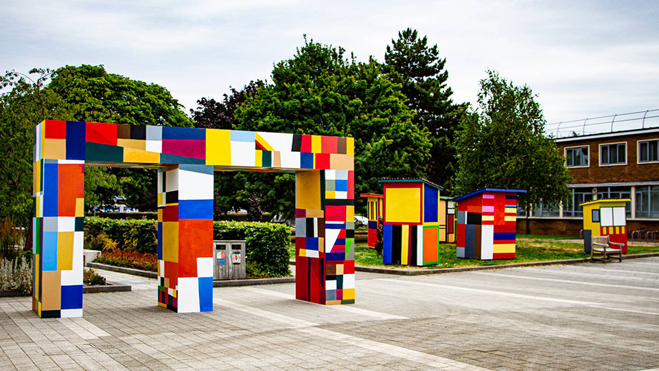 Colourful arch and huts in Shirley Pearce Square