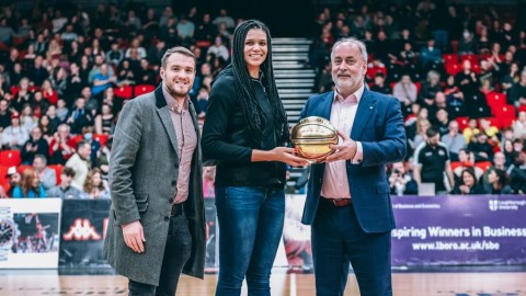 (L-R) Russell Levenston, Managing Director of Leicester Riders alongside former Loughborough student Oceana Hamilton (being awarded WBBL player of the month at half-time of a Riders game), and Professor Nick Jennings, Vice-Chancellor and President of Loughborough University.
