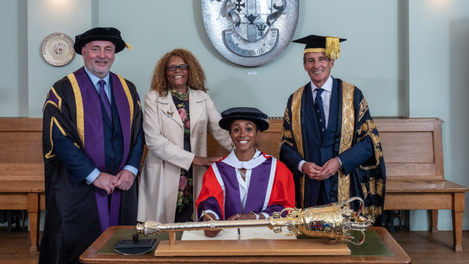 (L-R) Professor Nick Jennings, Vice-Chancellor and President of Loughborough University, Ebony's mum, Janet Rainford, Ebony-Jewel Rainford-Brent MBE, Lord Sebastian Coe, Chancellor of Loughborough University.

