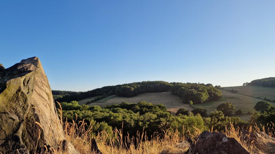 Blue sky and landscape at Buck Hill in Charnwood. 