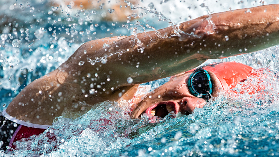 an athete swimming