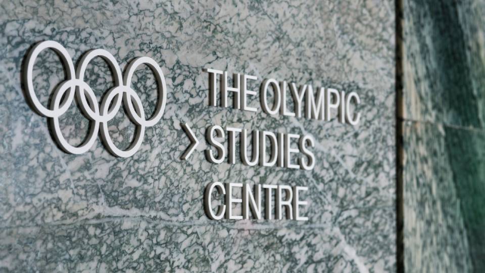 the logo of an olympic studies centre