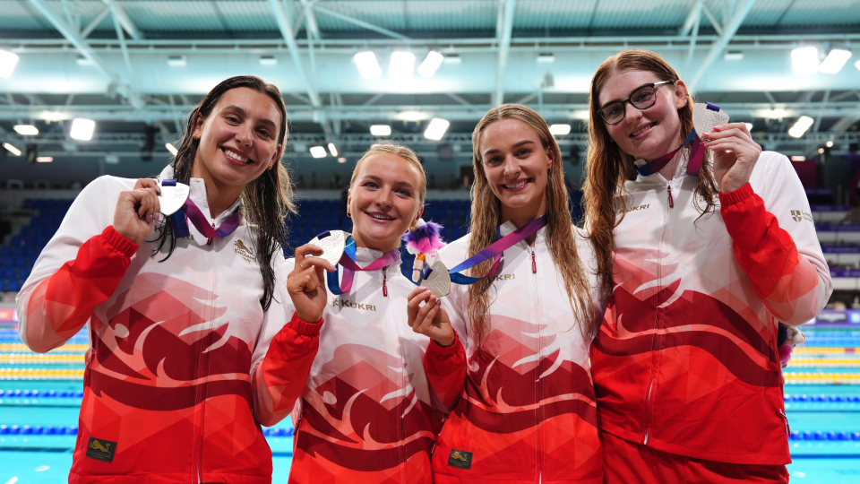 colbert and wood with silver medals