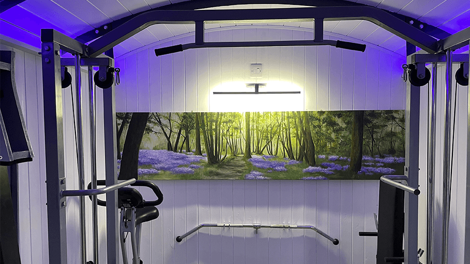 Inside of a renovated railway carriage as a luxury gym