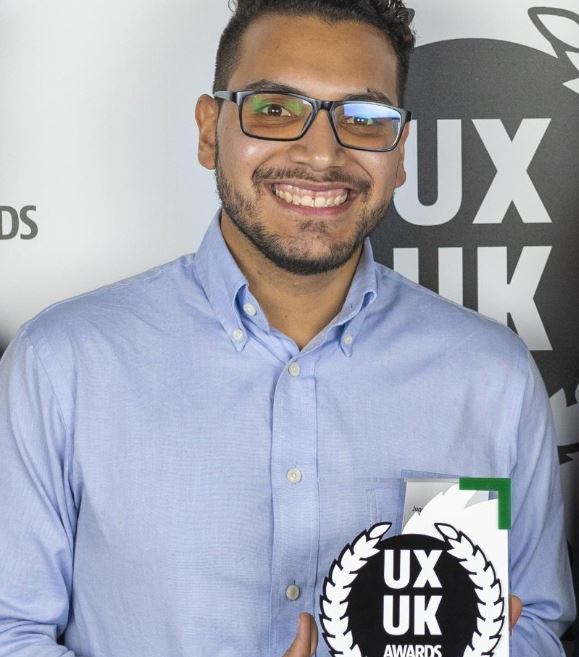 photo of Juan Encalada with UXUK award