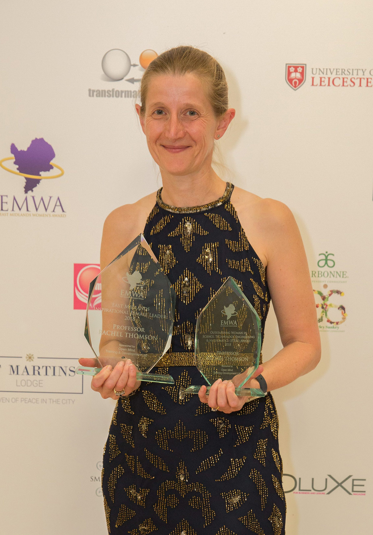 photo of Rachel Thomson with EMWA awards
