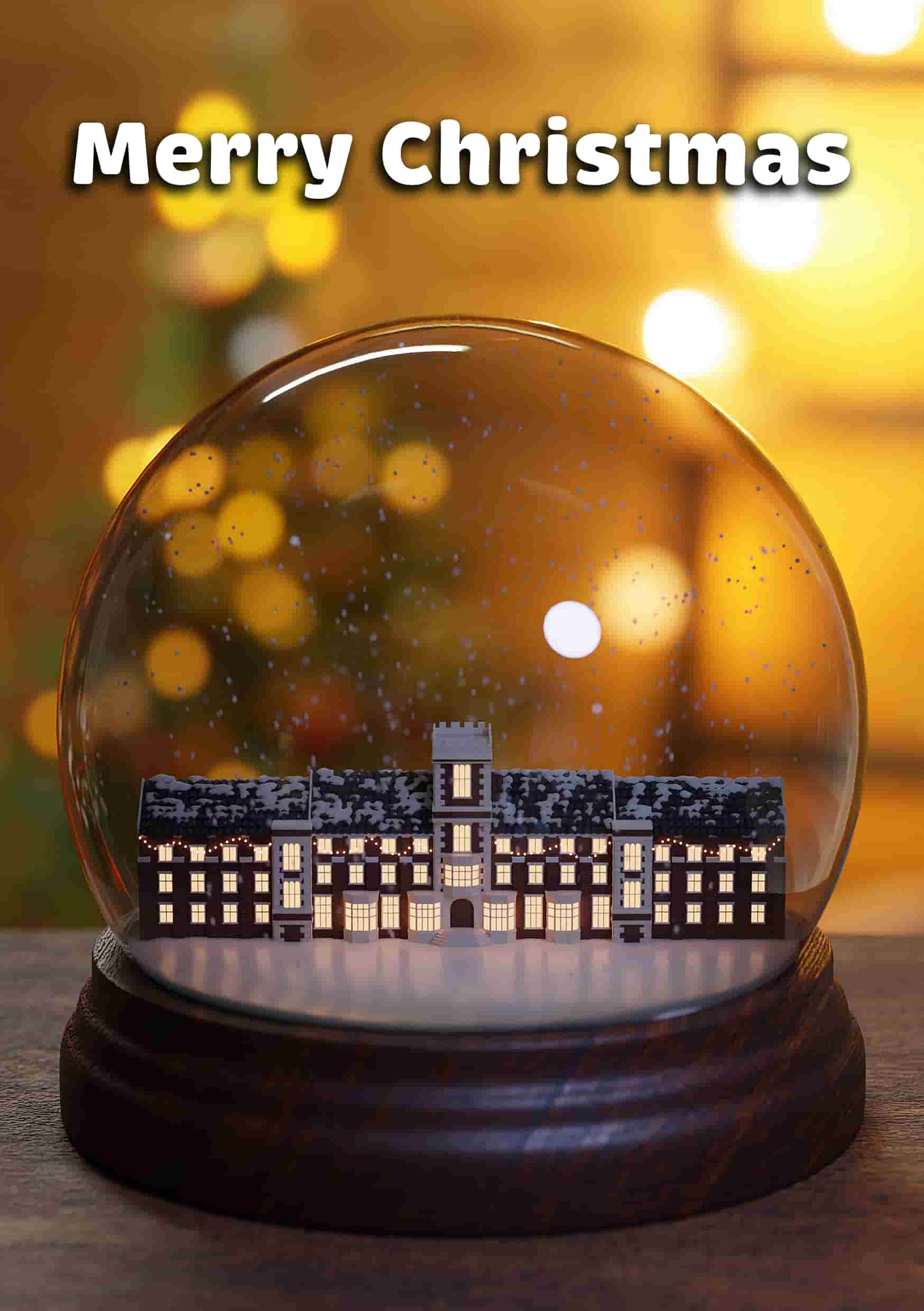 A glass snowglobe with Hazlerigg Building inside, Christmas lights behind and 'Merry Christmas' written above.