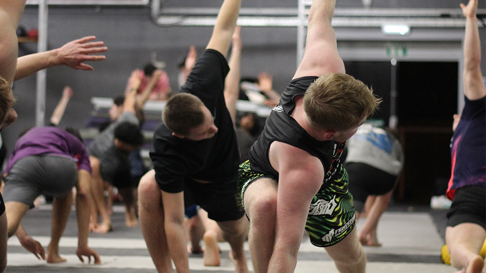 Students stretching before exercising