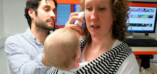 photo of a mum and baby being tested by Dr Davide Filingeri