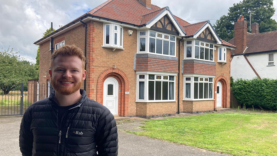 Photo of Ben Roberts stood outside the Loughborough test houses