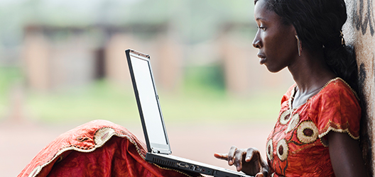 photo of a woman on a laptop