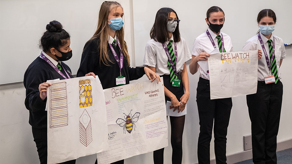 photo of pupils presenting at one of the Athena Stem events