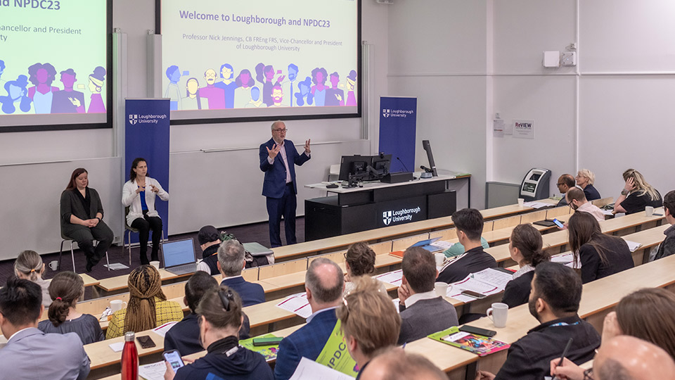 Vice-Chancellor addressing lecture room of people 