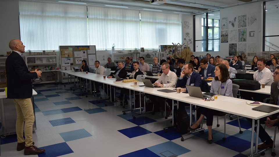 Photo of attendees listening to one of the presentation talks at Loughborough University