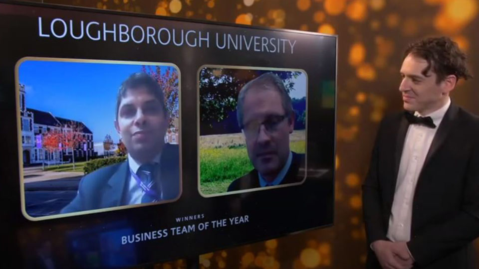 Screenshot of live stream ceremony showing Gagan and Dan accepting the award