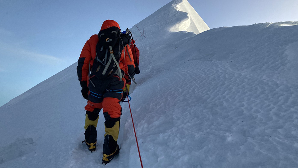 Image of Graham Keene reaching summit of Mount Everest.