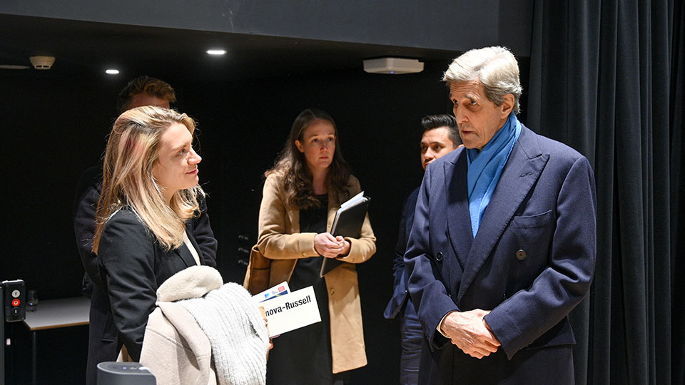 Judith Fortunova-Russell with John Kerry. Photo credit David Tett. 