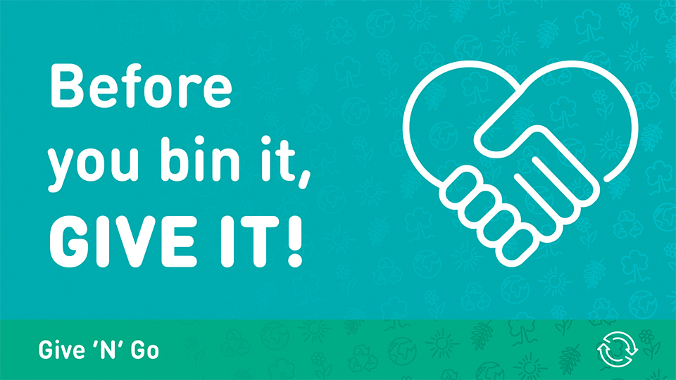 Blue and green illustration with a heart made out of two hands holding one another. The words 'Before you bin it, give it' included in white writing, alongside a recycling symbol 