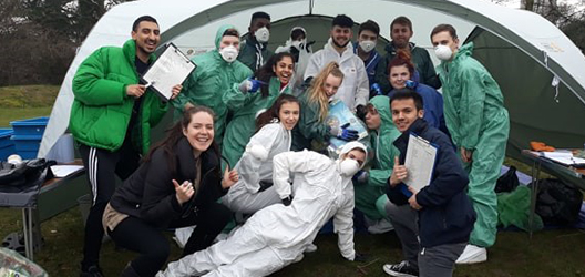 Photo of student volunteers taking part in Part 2 of Grime Scene Investigation