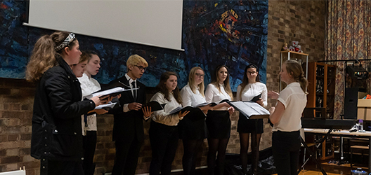 Photo of a group of students singing