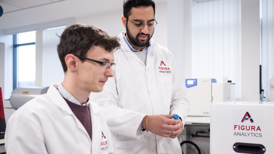 two researchers working in a lab