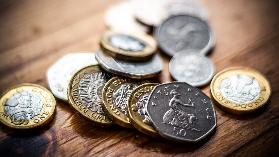 Photos of £1, 50p and other silver coins