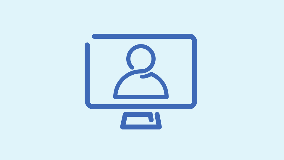 Blue icon of a person on a computer monitor.