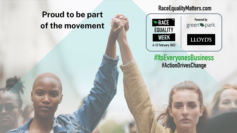 photo of two women stood holding hands together up in the air with the Race Equality Week logo and the words 'Proud to be part of the Movement' included