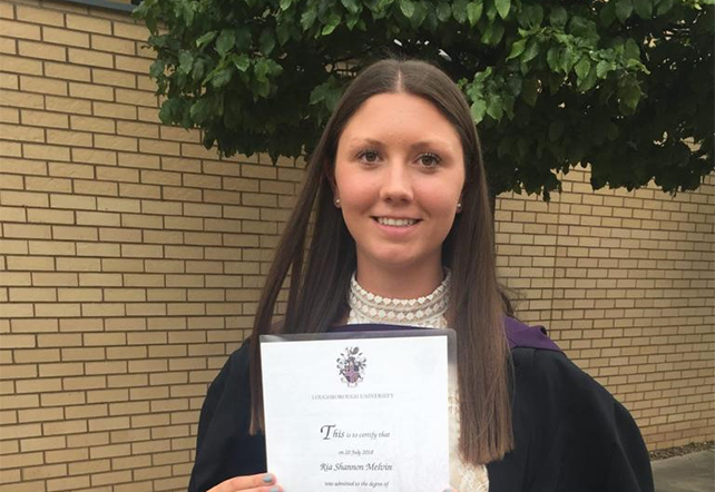 Headshot of Ria Melvin at graduation