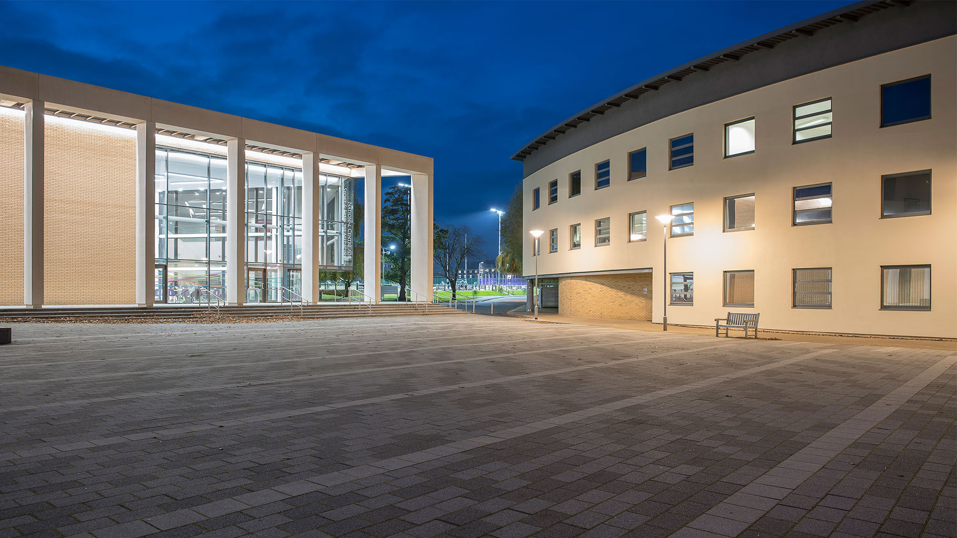 Photo of Shirley Pearce Square and the NCSEM Building at night