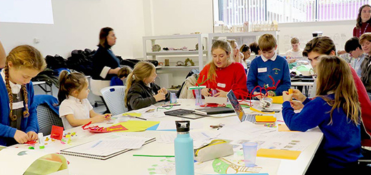 St Bart's pupils and Loughborough University students working on a design for the Discovery Zone. 