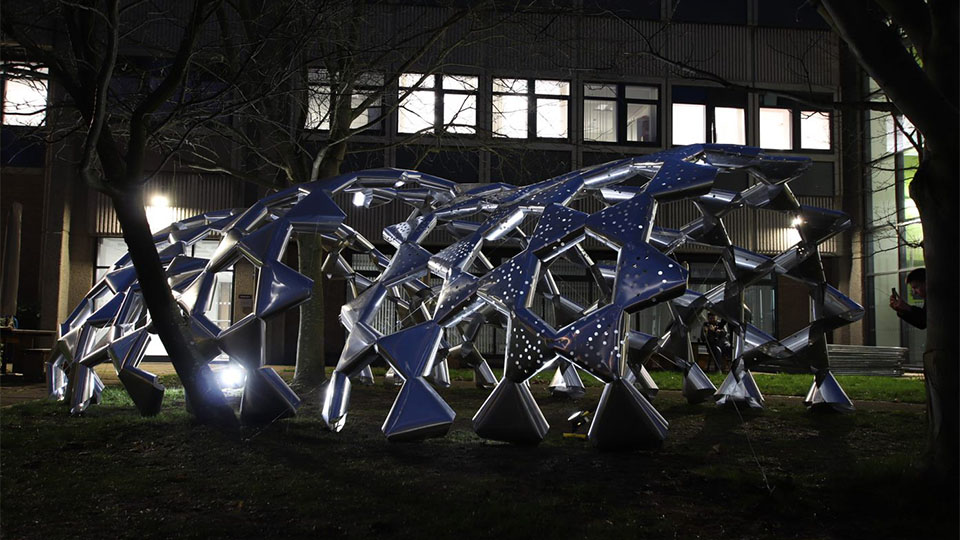 photo of the students' metal structure in the dark 